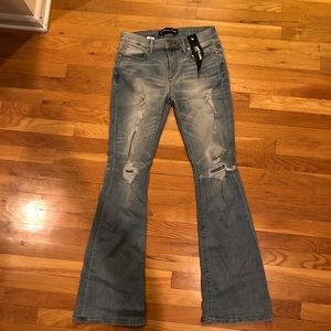 Express NWT slim flare midrise destructed jeans